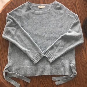 Light blue sweater with side ties